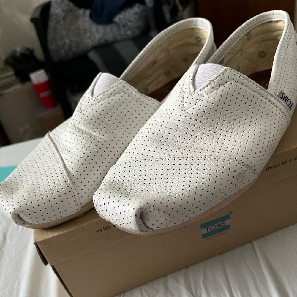 Like new Toms exclusively made for Neiman Marcus